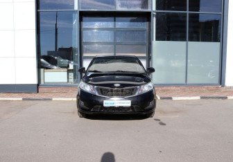 Подержанный автомобиль Kia Rio Sedan 2013 года (8 фото)
