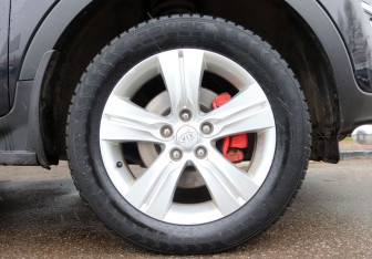 Подержанный автомобиль Kia Sportage 2012 года (9 фото)