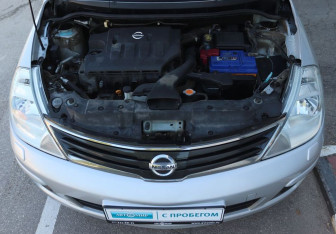 Подержанный автомобиль Nissan Tiida Hatchback 2010 года (9 фото)