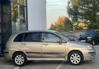 Подержанный автомобиль Suzuki Liana Wagon 2005 года (6 фото)
