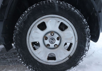 Подержанный автомобиль Nissan Terrano 2015 года (9 фото)