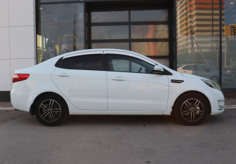 Подержанный автомобиль Kia Rio Sedan 2013 года (6 фото)