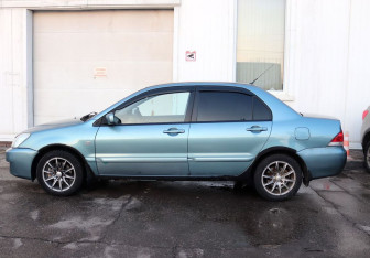 Подержанный автомобиль Mitsubishi Lancer Sedan 2006 года (6 фото)