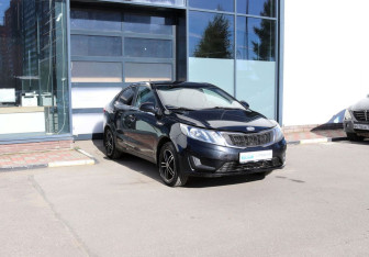 Подержанный автомобиль Kia Rio Sedan 2013 года (7 фото)