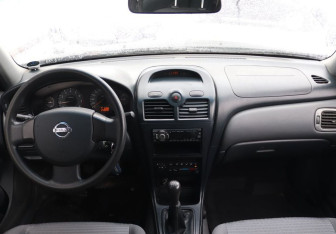 Подержанный автомобиль Nissan Almera Classic 2006 года (14 фото)