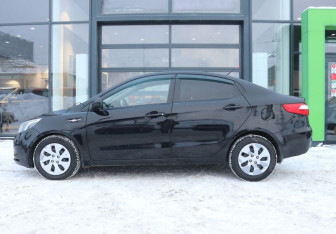 Подержанный автомобиль Kia Rio Sedan 2014 года (2 фото)