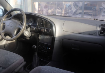 Подержанный автомобиль Kia Spectra Sedan 2006 года (14 фото)