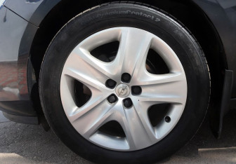 Подержанный автомобиль Opel Astra Hatchback 2011 года (15 фото)