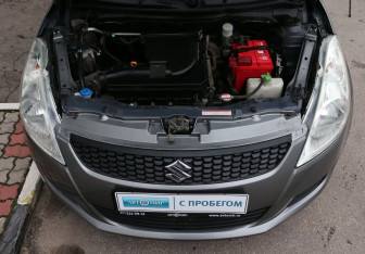 Подержанный автомобиль Suzuki Swift Hatchback 2011 года (10 фото)