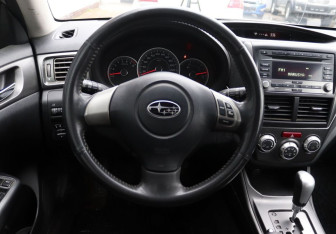 Подержанный автомобиль Subaru Impreza Hatchback 2010 года (15 фото)