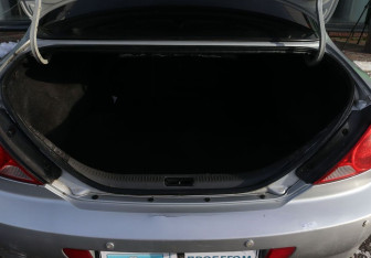 Подержанный автомобиль Kia Spectra Sedan 2006 года (11 фото)