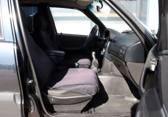 Подержанный автомобиль Chevrolet Niva 2011 года (12 фото)