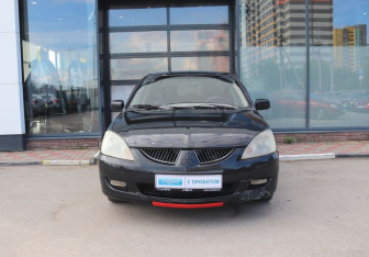 Подержанный автомобиль Mitsubishi Lancer Sedan 2004 года (8 фото)