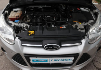 Подержанный автомобиль Ford Focus Sedan 2014 года (18 фото)