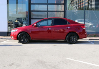 Подержанный автомобиль Kia Cerato Sedan 2011 года (7 фото)