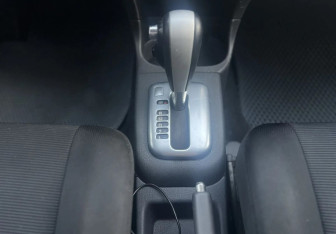 Подержанный автомобиль Suzuki Liana Wagon 2005 года (13 фото)