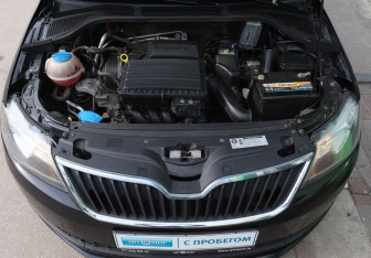 Подержанный автомобиль Skoda Rapid Liftback 2015 года (9 фото)