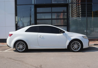 Подержанный автомобиль Kia Cerato Coupe 2011 года (6 фото)