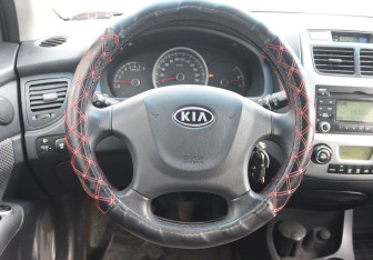 Подержанный автомобиль Kia Sportage 2010 года (12 фото)