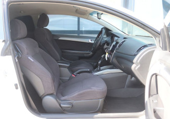 Подержанный автомобиль Kia Cerato Coupe 2011 года (13 фото)