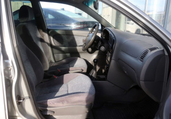 Подержанный автомобиль Kia Spectra Sedan 2006 года (13 фото)