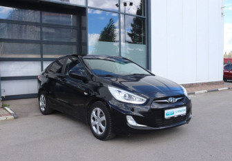 Подержанный автомобиль Hyundai Solaris Sedan 2013 года (7 фото)