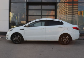 Подержанный автомобиль Kia Rio Sedan 2013 года (2 фото)