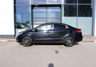 Подержанный автомобиль Kia Rio Sedan 2013 года (2 фото)