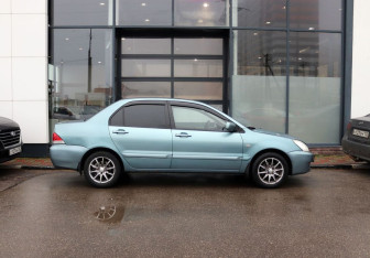 Подержанный автомобиль Mitsubishi Lancer Sedan 2006 года (6 фото)