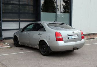 Подержанный автомобиль Nissan Primera Sedan 2004 года (11 фото)