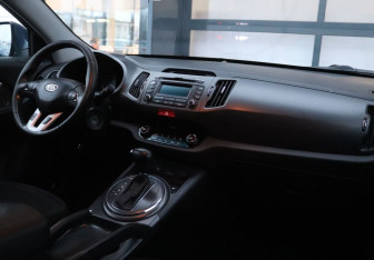 Подержанный автомобиль Kia Sportage 2011 года (14 фото)