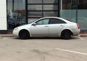Подержанный автомобиль Nissan Primera Sedan 2004 года (13 фото)