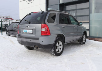 Подержанный автомобиль Kia Sportage 2010 года (8 фото)