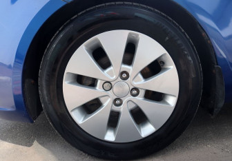 Подержанный автомобиль Kia Rio Sedan 2012 года (9 фото)