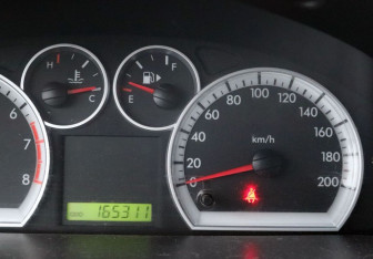 Подержанный автомобиль Chevrolet Aveo Hatchback 2010 года (18 фото)