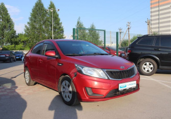 Подержанный автомобиль Kia Rio Sedan 2014 года (7 фото)