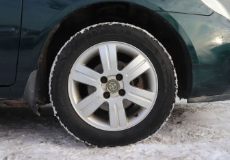 Подержанный автомобиль Toyota Corolla Sedan 2006 года (9 фото)