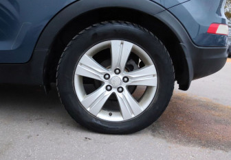 Подержанный автомобиль Kia Sportage 2011 года (9 фото)