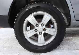 Подержанный автомобиль Kia Sportage 2010 года (15 фото)