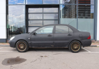 Подержанный автомобиль Mitsubishi Lancer Sedan 2005 года (2 фото)