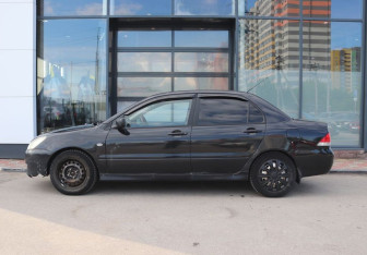 Подержанный автомобиль Mitsubishi Lancer Sedan 2004 года (2 фото)