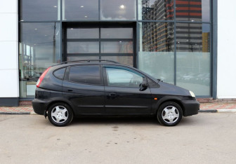 Подержанный автомобиль Daewoo Tacuma 2002 года (6 фото)