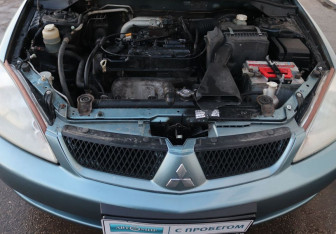 Подержанный автомобиль Mitsubishi Lancer Sedan 2006 года (16 фото)